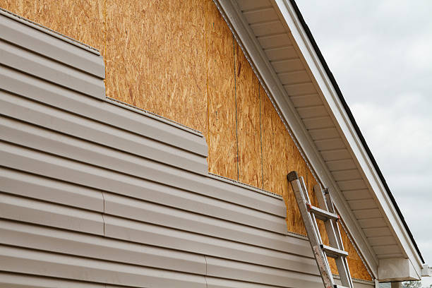Professional Siding Installation technician working in Dupont, CO